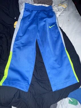 Nike Blue Joggers with Lime and Gray Stripes